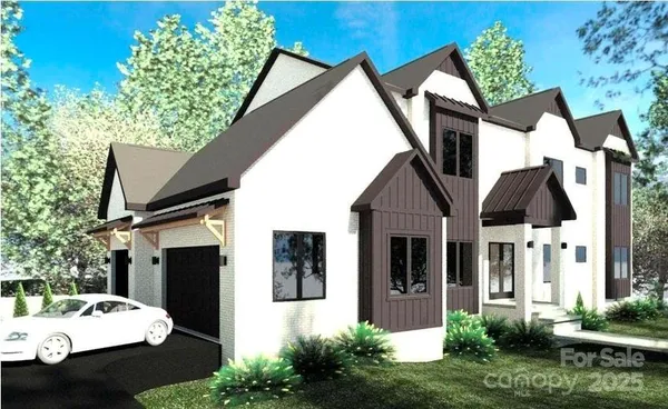 a front view of a house with a garden