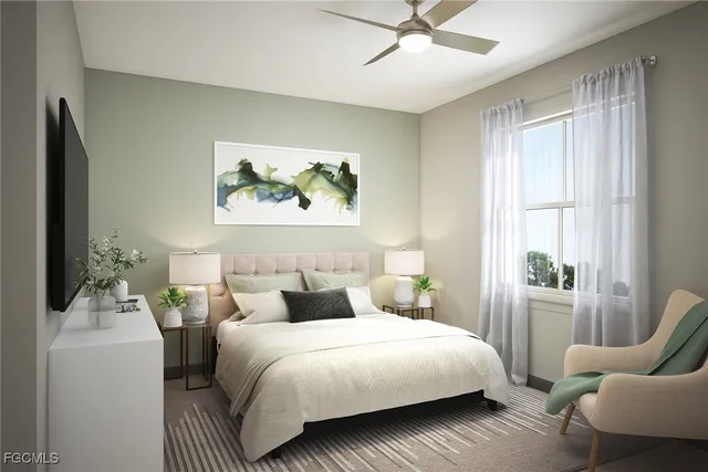 a bedroom with a bed and a painting on the wall