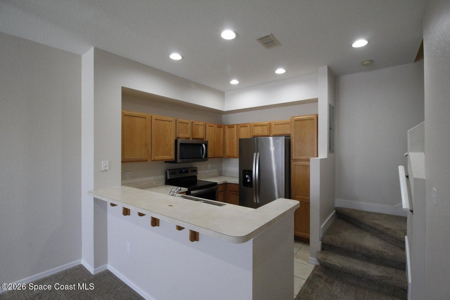 105 Turpial Way, Unit 103 Melbourne, FL 32901 - Photo 3 of 16 20251008153326502575000000-o