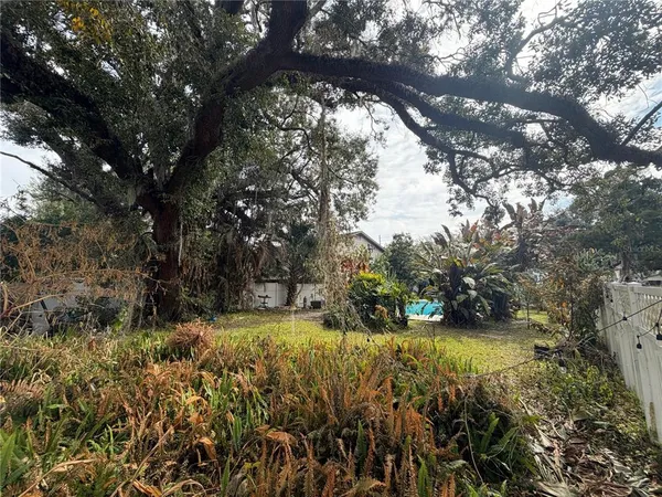 a view of outdoor space and yard