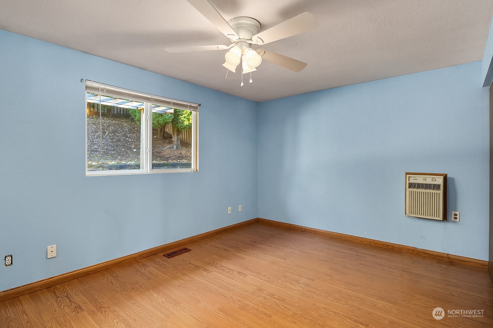 22931 19th Drive Southeast Bothell, WA 98021 - Photo 11 of 21 a view of an empty room with a window