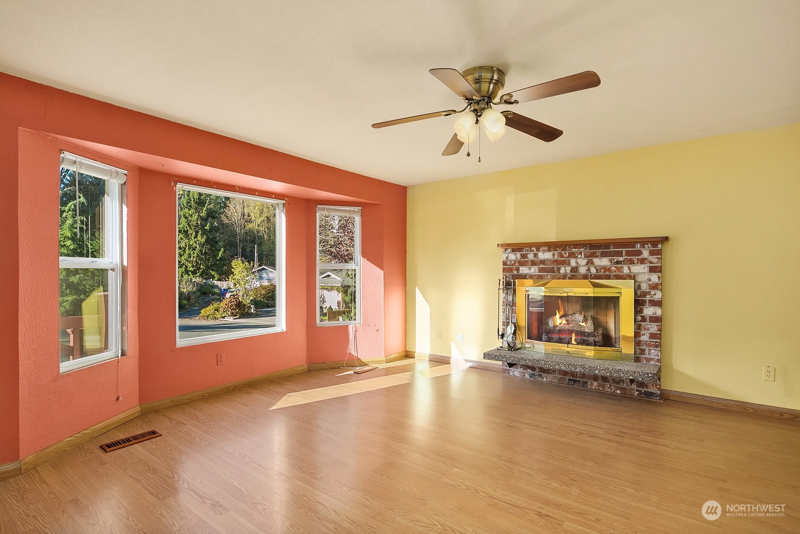 22931 19th Drive Southeast Bothell, WA 98021 - Photo 5 of 21 a view of an empty room with a window and a fireplace