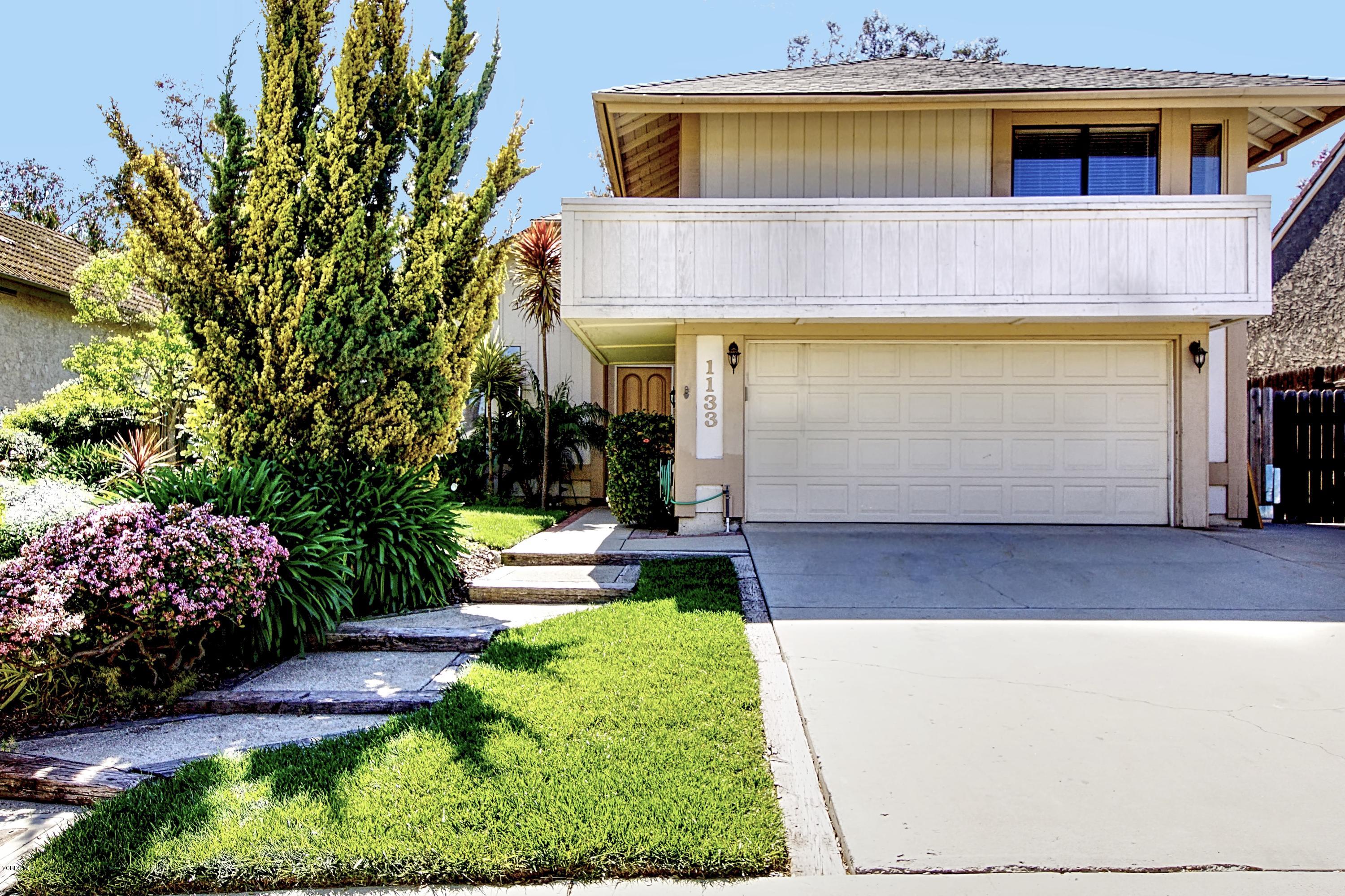 1133 Old Ranch Road Camarillo, CA 93012 - Photo 2 of 37 a front view of a house with garden