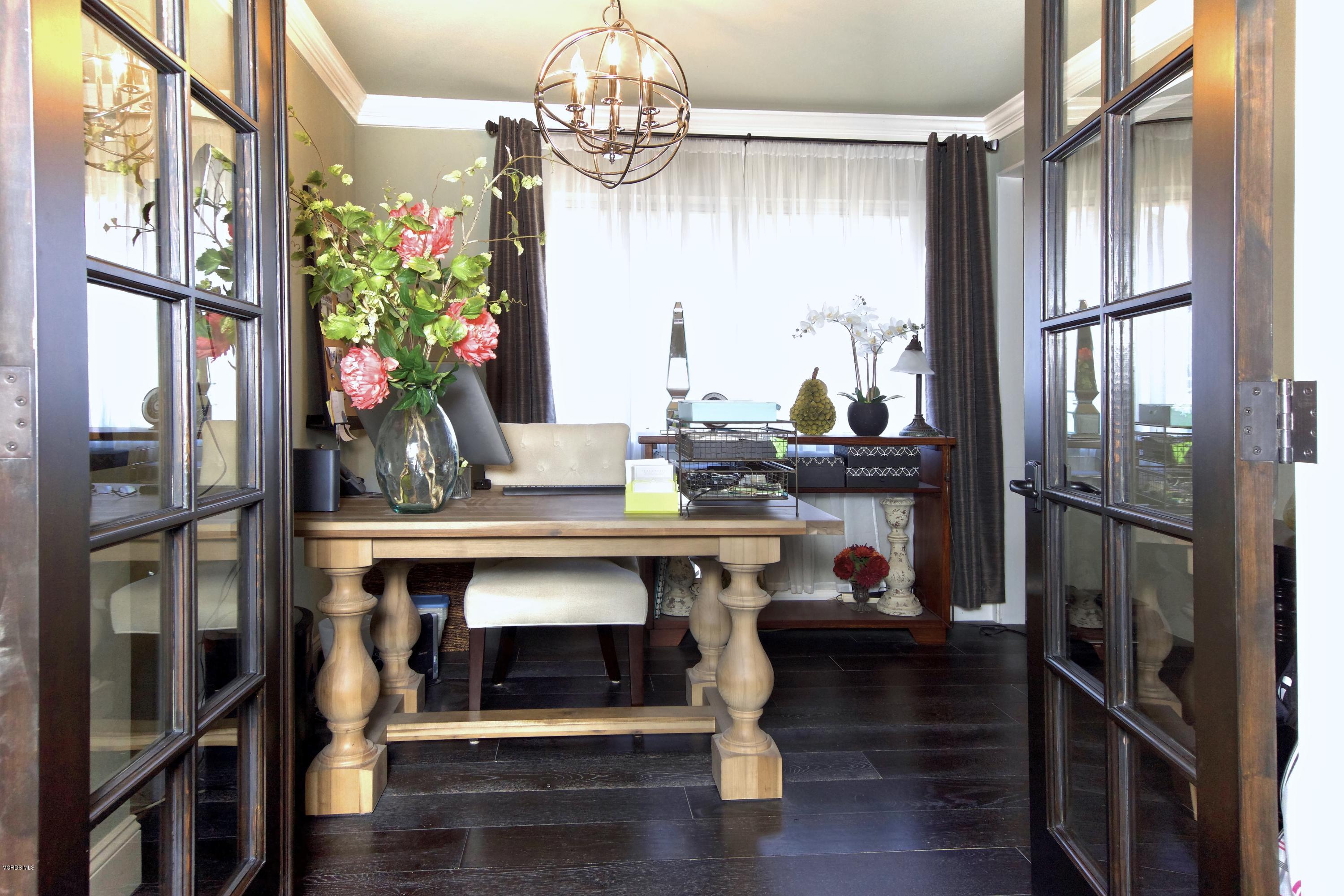 1133 Old Ranch Road Camarillo, CA 93012 - Photo 27 of 37 a room with wooden floor