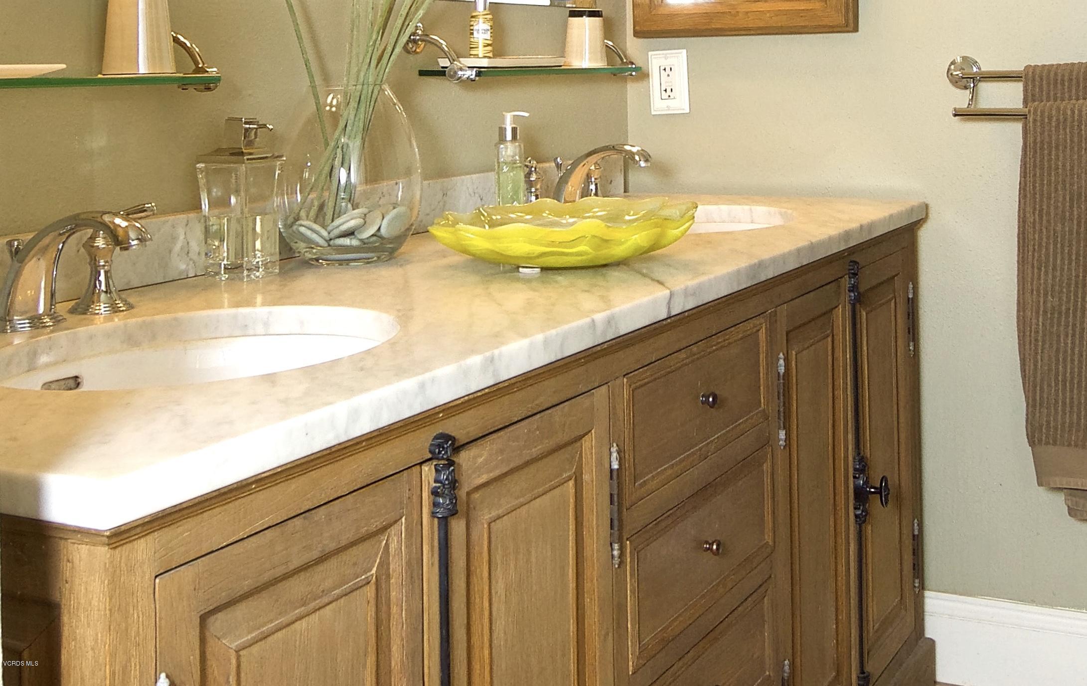 1133 Old Ranch Road Camarillo, CA 93012 - Photo 30 of 37 a bathroom with a granite countertop sink and a mirror