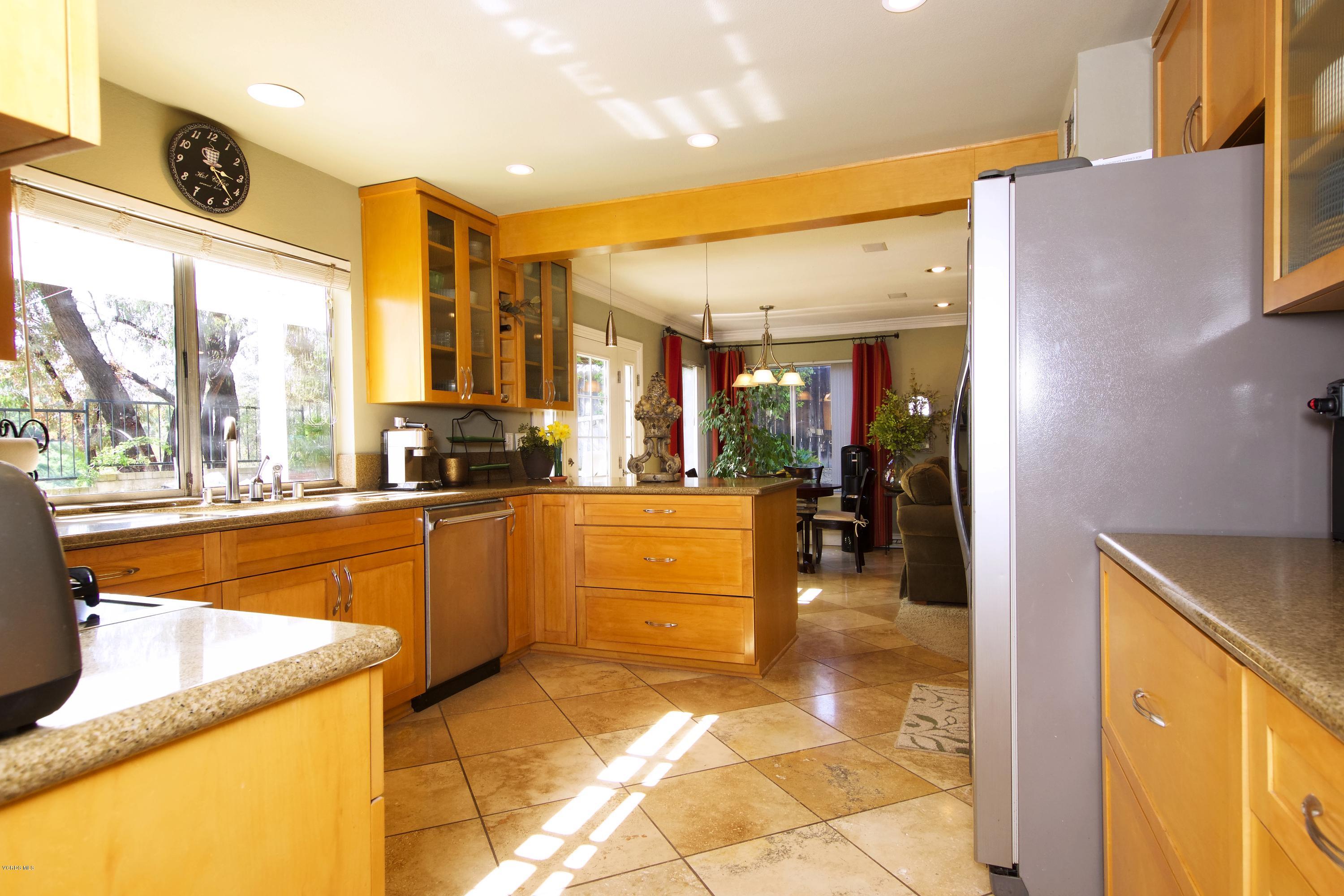 1133 Old Ranch Road Camarillo, CA 93012 - Photo 10 of 37 a large white kitchen with a large window