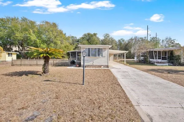 a view of a house with a park