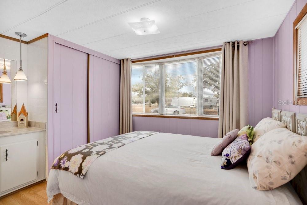 6 Florence Boulevard DeBary, FL 32713 - Photo 18 of 44 a bedroom with a bed and window