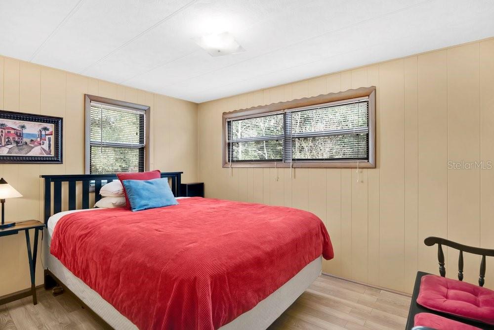 6 Florence Boulevard DeBary, FL 32713 - Photo 21 of 44 a bed sitting in a bedroom next to a window