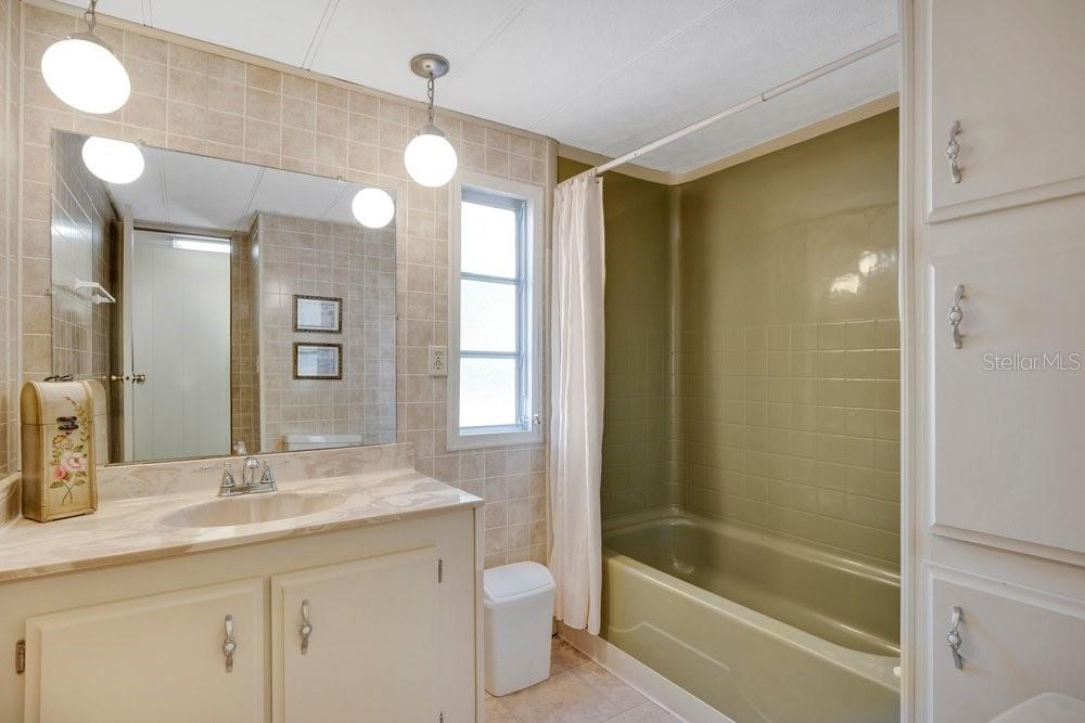 6 Florence Boulevard DeBary, FL 32713 - Photo 23 of 44 a bathroom with a granite countertop sink a toilet and shower