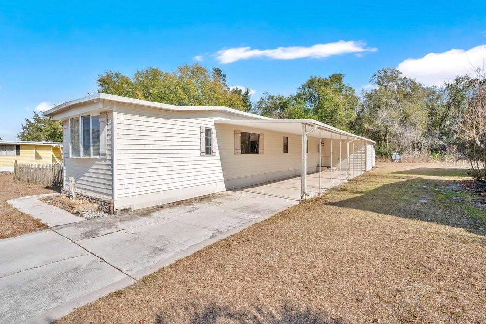 6 Florence Boulevard DeBary, FL 32713 - Photo 3 of 44 a view of a house with a backyard
