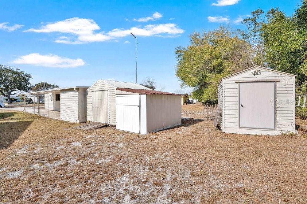 6 Florence Boulevard DeBary, FL 32713 - Photo 32 of 44 a view of a house with a yard and garage