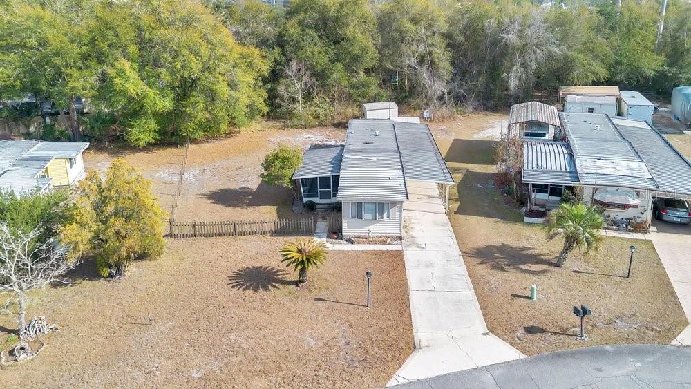 6 Florence Boulevard DeBary, FL 32713 - Photo 6 of 44 an aerial view of a house with swimming pool