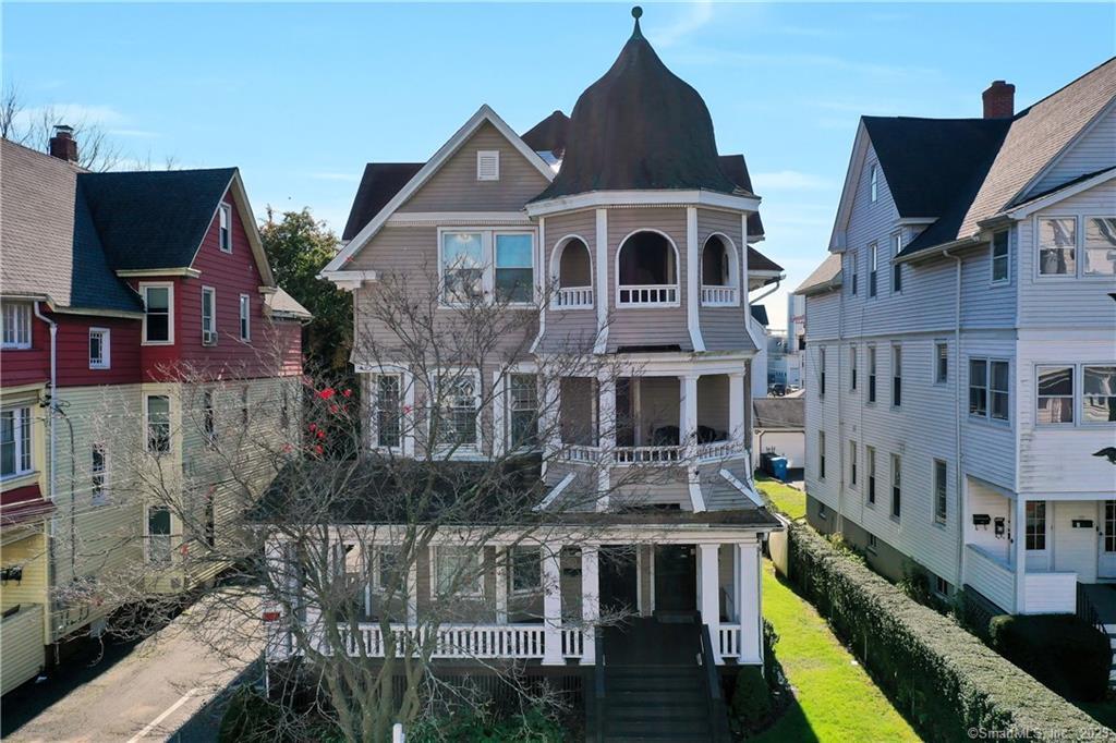 351 Chestnut Street New Britain, CT 06051 - Photo 1 of 1 a aerial view of a house with a yard