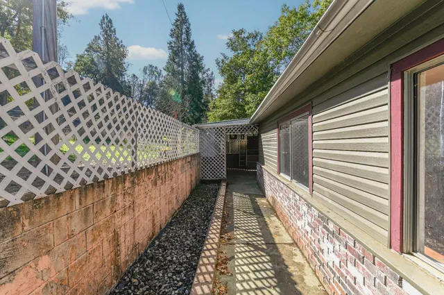 a view of a yard with an outdoor space