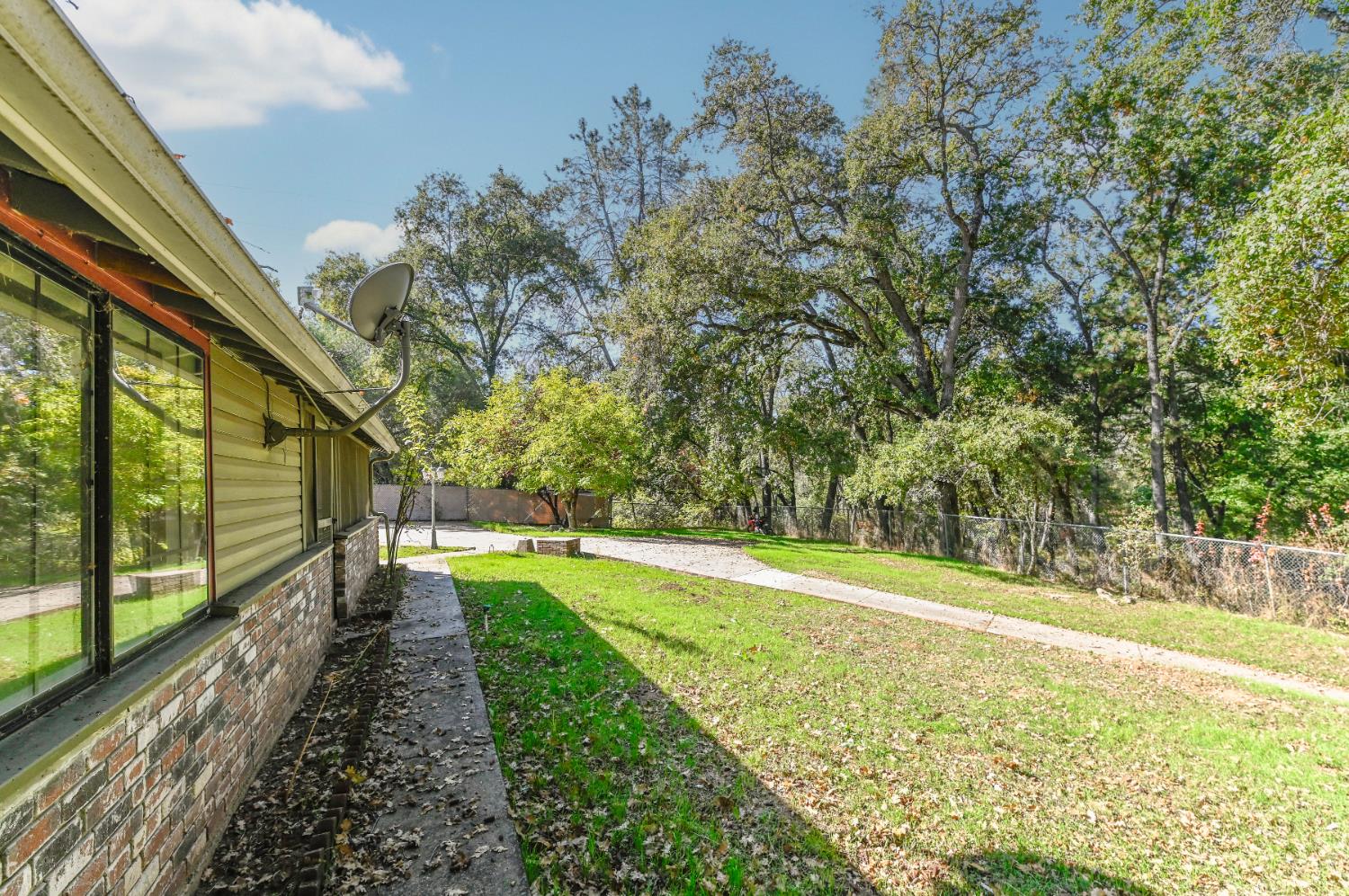 17542 Climax Road Jackson, CA 95642 - Photo 29 of 86 a view of a yard with an outdoor space