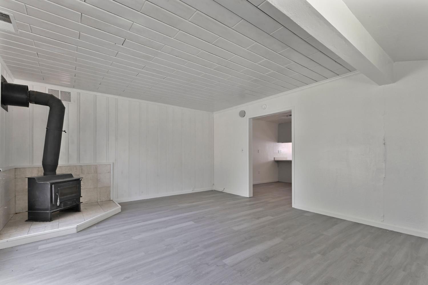 17542 Climax Road Jackson, CA 95642 - Photo 64 of 86 a view of a livingroom with wooden floor and furniture