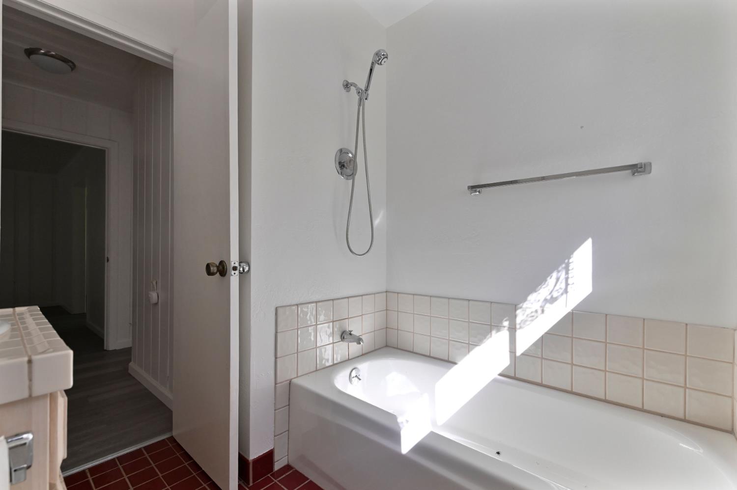 17542 Climax Road Jackson, CA 95642 - Photo 70 of 86 a bathroom with a tub and a shower