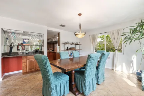 a kitchen with stainless steel appliances granite countertop sink and cabinets