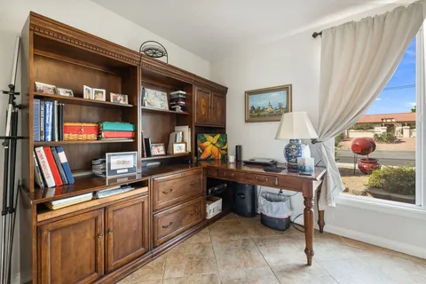 a bathroom with a toilet a sink and a mirror