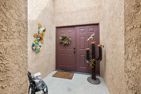 a living room with furniture fireplace and a flat screen tv