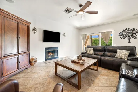 a kitchen with stainless steel appliances granite countertop a stove sink and microwave
