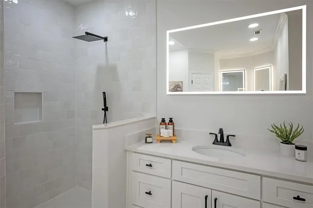 a bathroom with a bathtub and window