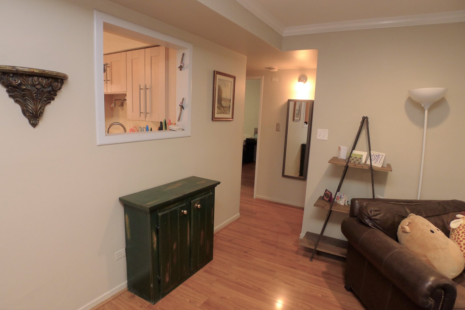 547 Sheridan Road, Unit 1E Evanston, IL 60202 - Photo 10 of 16 a living room with furniture and a wooden floor