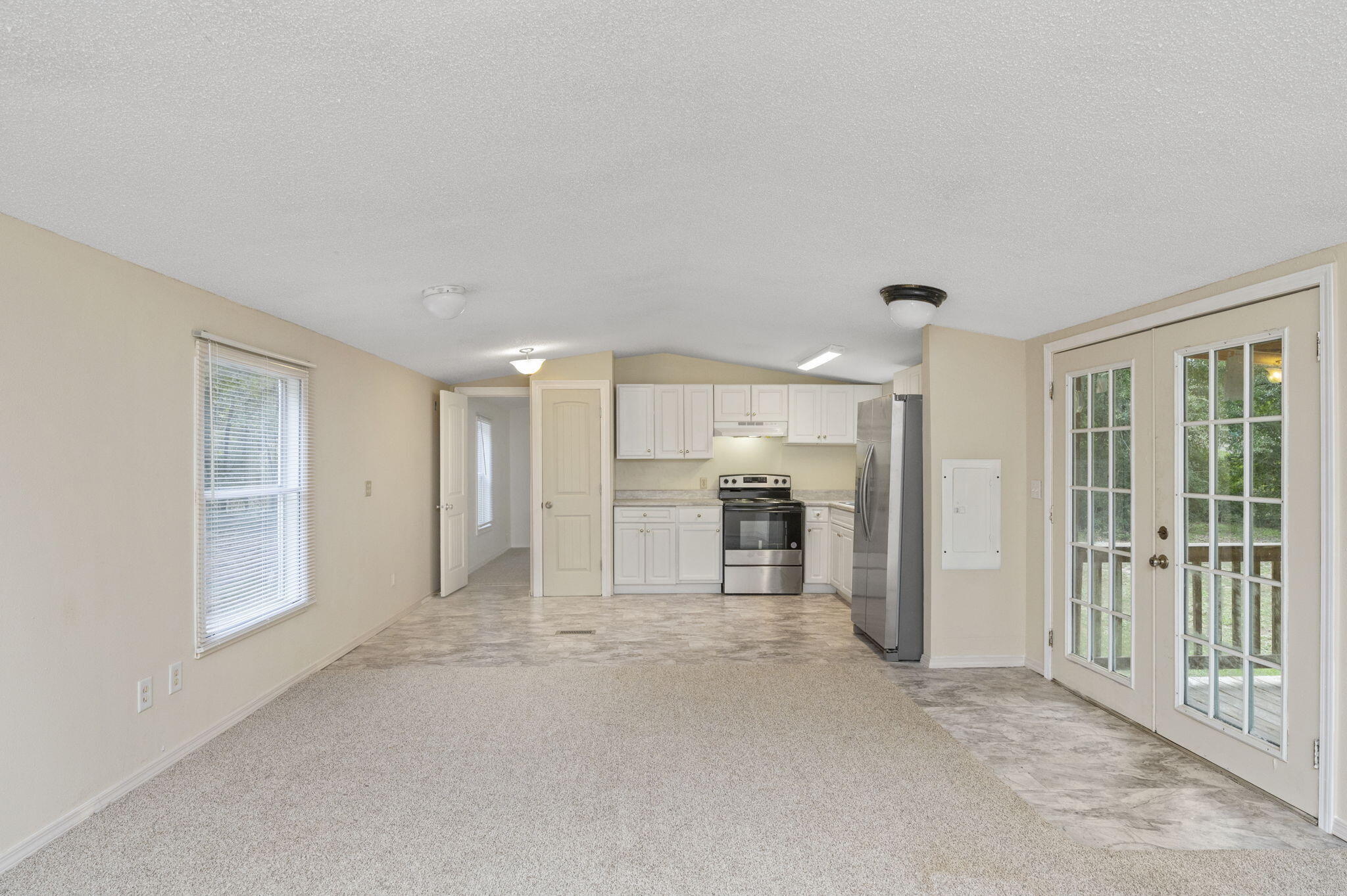 1108 Country Living Road Baker, FL 32531 - Photo 11 of 33 a view of a livingroom with a furniture and window