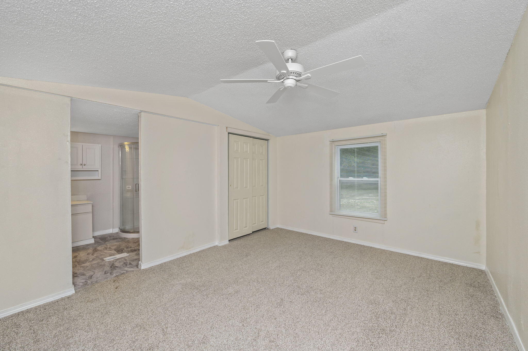 1108 Country Living Road Baker, FL 32531 - Photo 16 of 33 a view of an empty room with a window