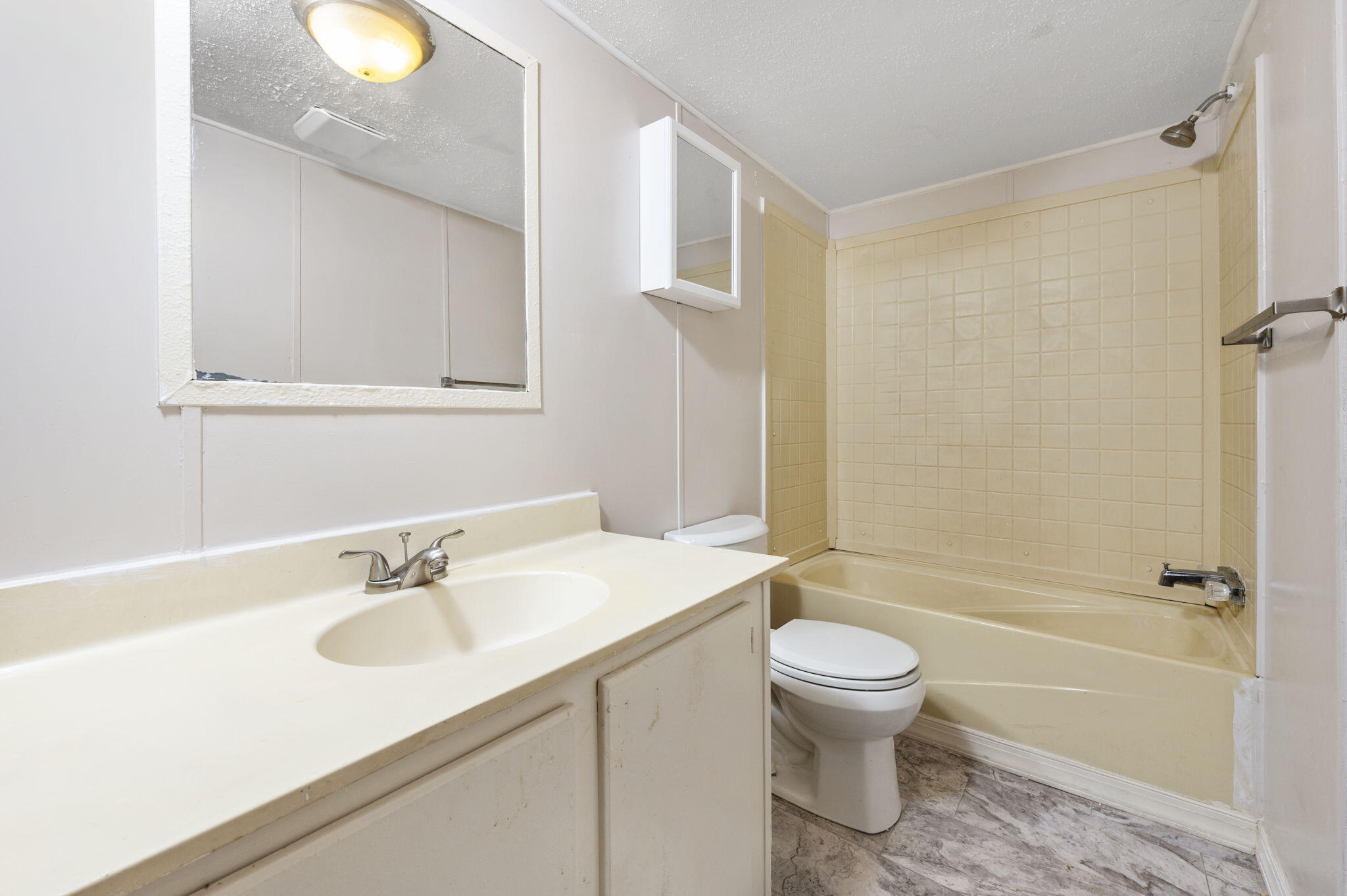 1108 Country Living Road Baker, FL 32531 - Photo 25 of 33 a bathroom with a sink toilet and shower
