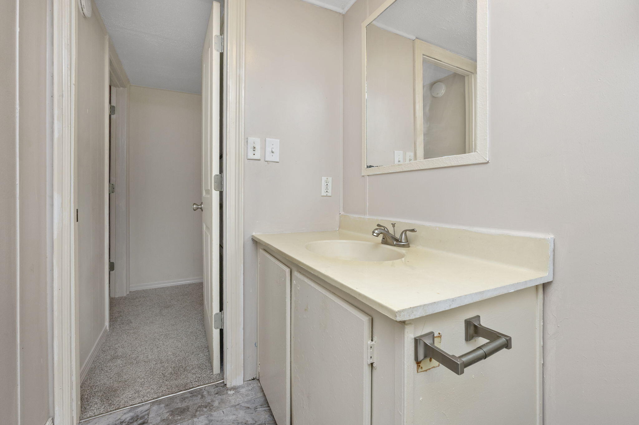 1108 Country Living Road Baker, FL 32531 - Photo 26 of 33 a bathroom with a sink and a mirror