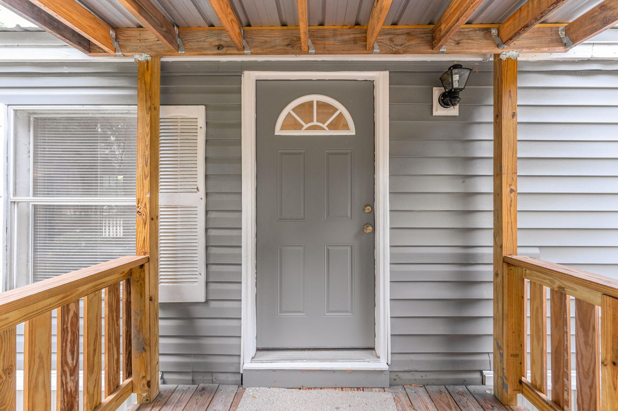 1108 Country Living Road Baker, FL 32531 - Photo 6 of 33 a front view of a building with a window