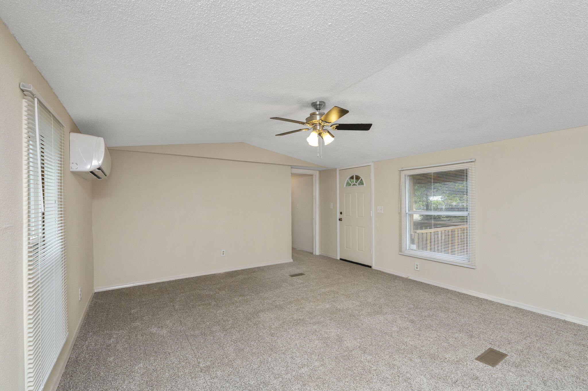 1108 Country Living Road Baker, FL 32531 - Photo 10 of 33 a view of an empty room with a window