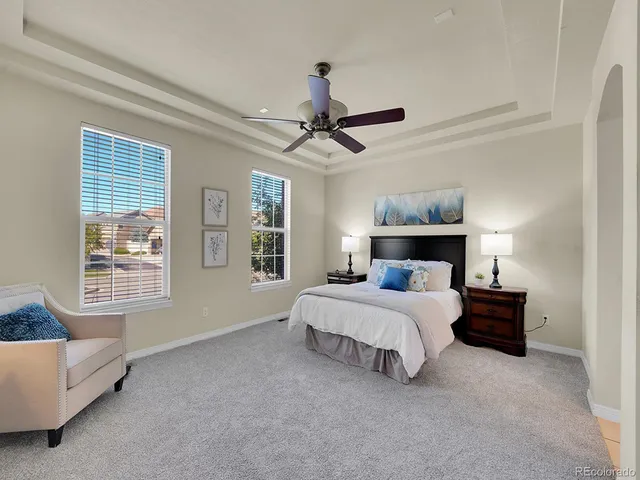 a bed room with a bed and a couch