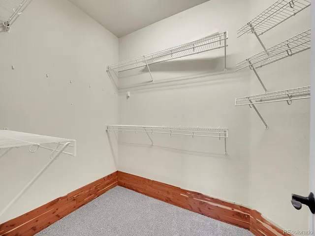 a view of small space with racks on the wall
