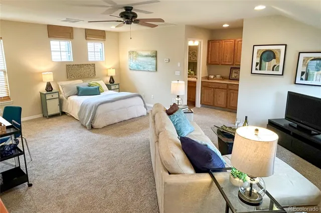 a bedroom with a bed and furniture