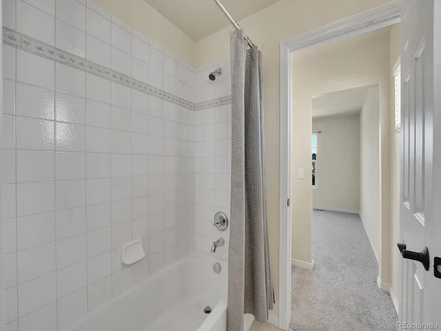 a bathroom with a bathtub