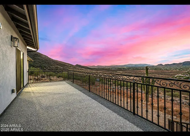 a view of a balcony with an outdoor space