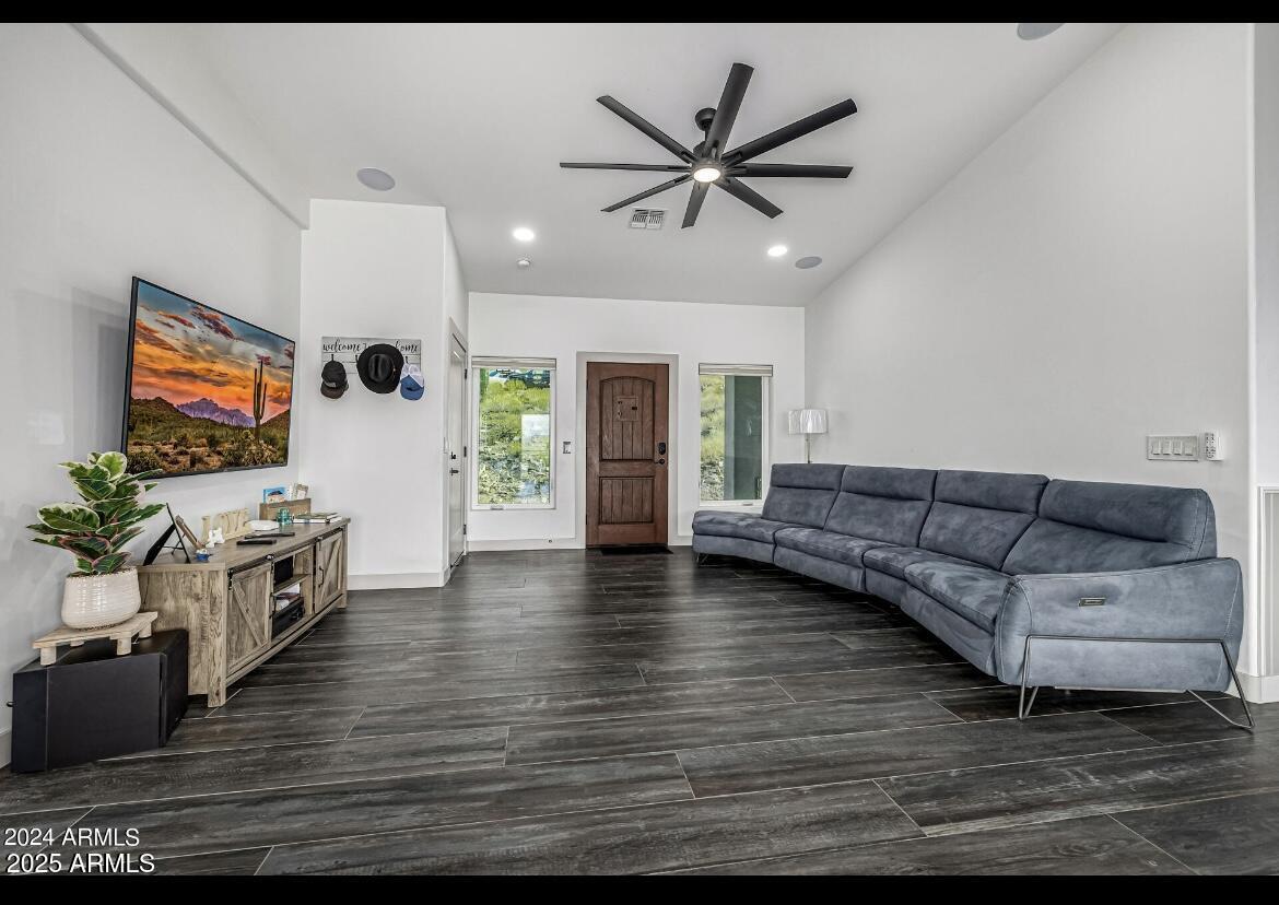 1829 West Cloud Road Phoenix, AZ 85086 - Photo 4 of 18 a living room with furniture and a flat screen tv