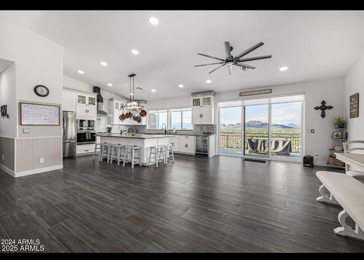 1829 West Cloud Road Phoenix, AZ 85086 - Photo 6 of 18 a living room with furniture and kitchen view