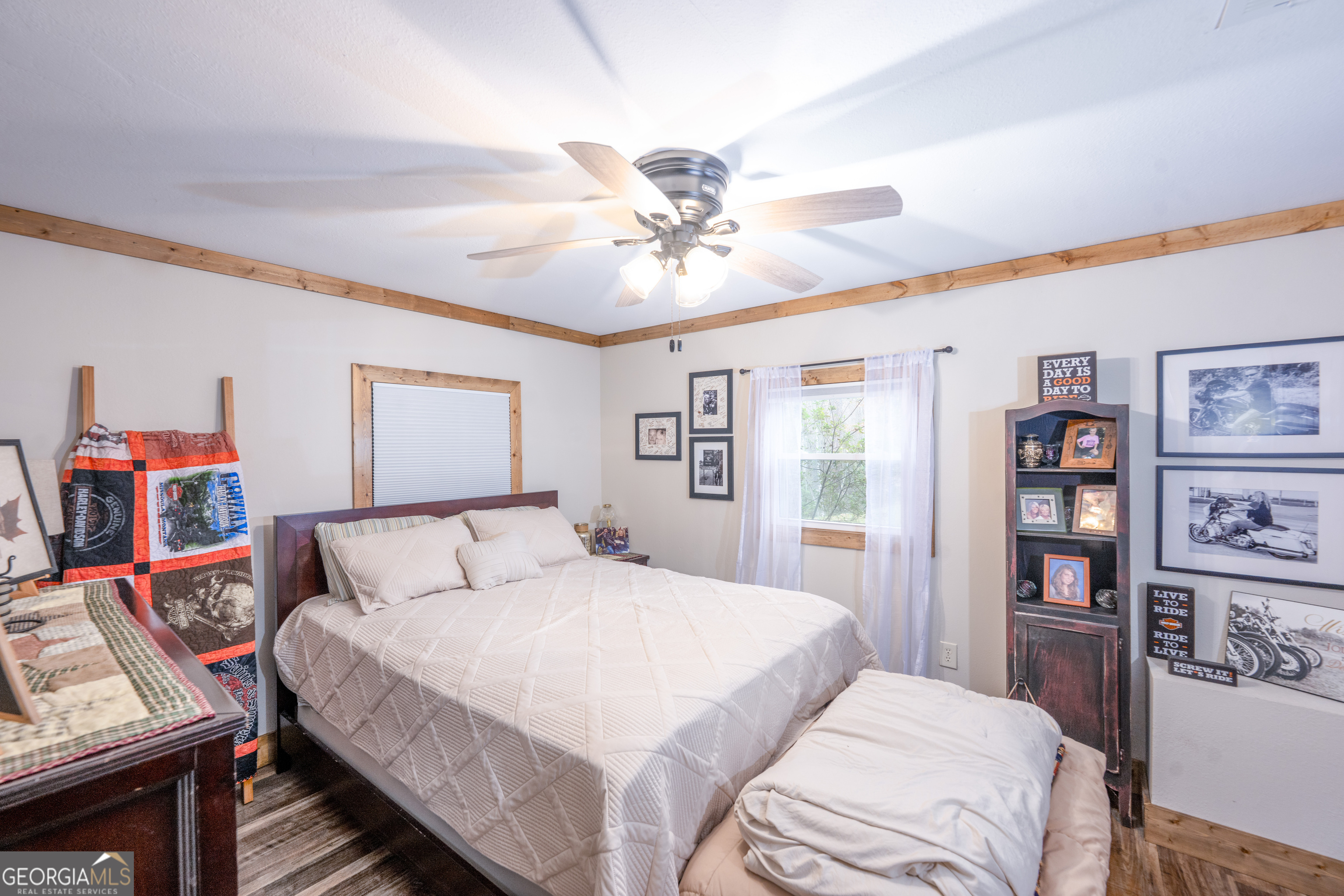 206 Hedden Road Murphy, NC 28906 - Photo 21 of 29 a bedroom with a bed furniture and a chandelier