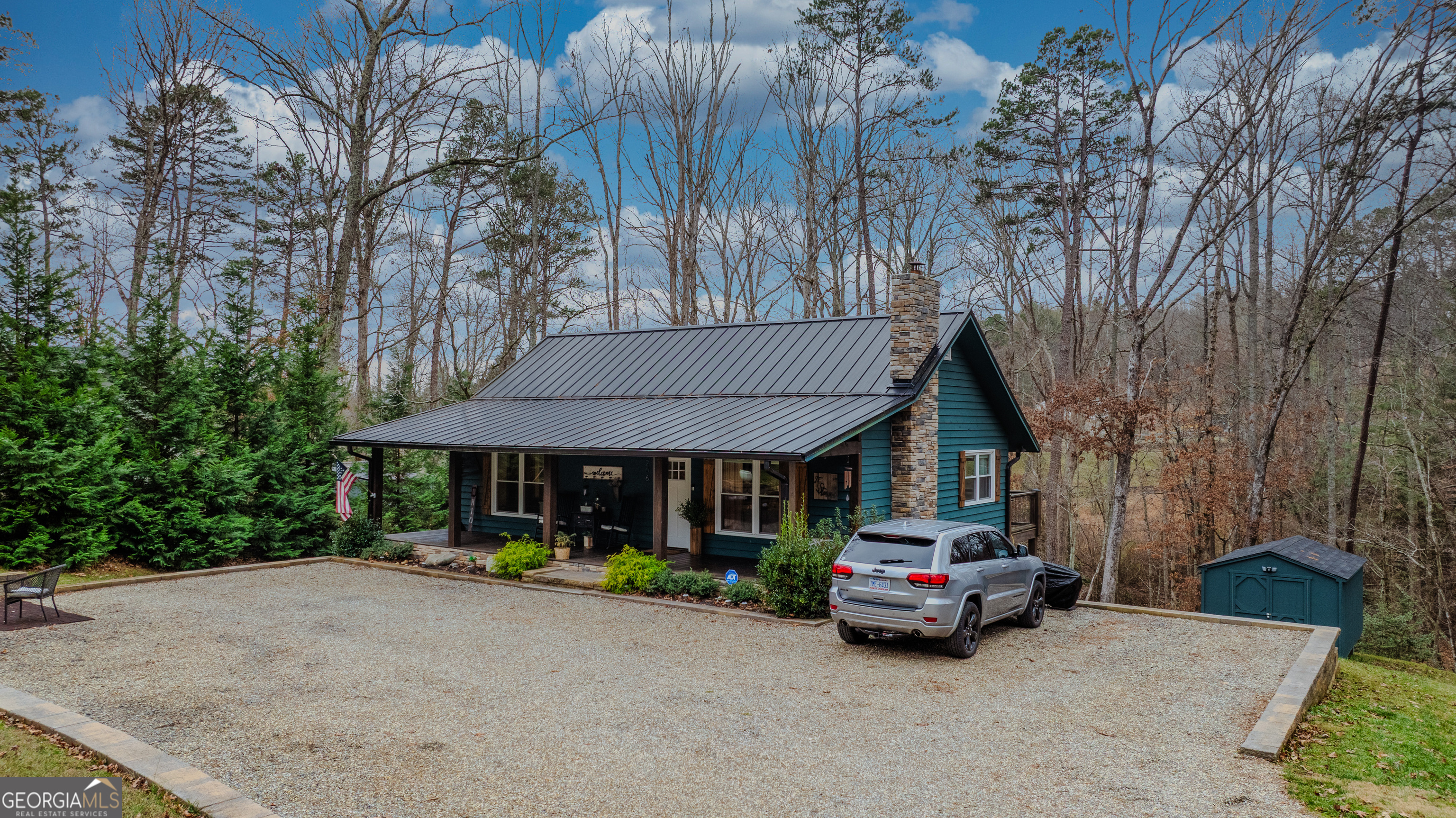206 Hedden Road Murphy, NC 28906 - Photo 25 of 29 a car parked in front of a house