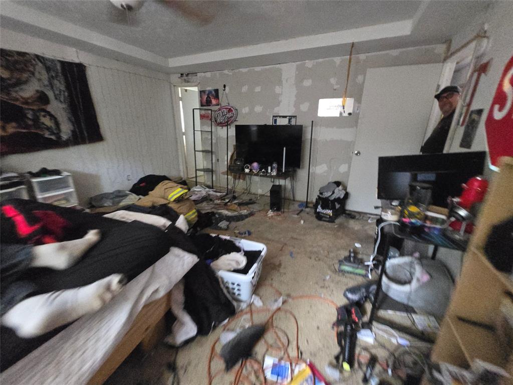 5082 Bennett Road Wylie, TX 75098 - Photo 15 of 26 a room with furniture closet and a flat screen tv