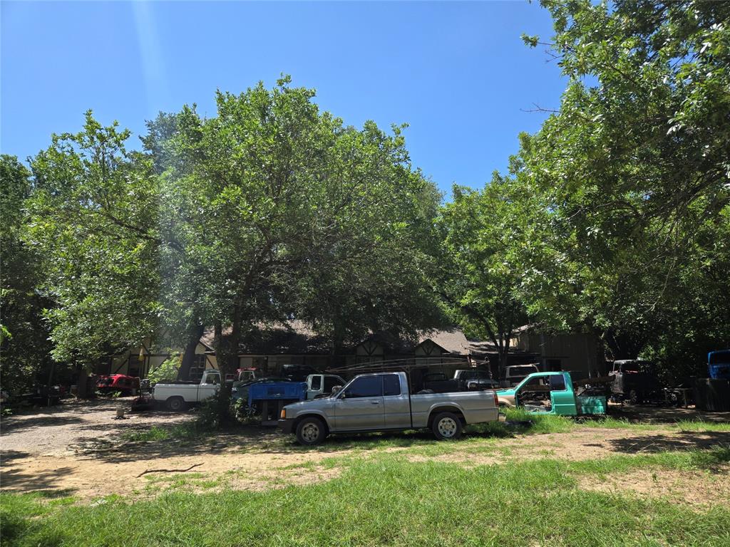 5082 Bennett Road Wylie, TX 75098 - Photo 7 of 26 a view of a house with a yard and sitting area
