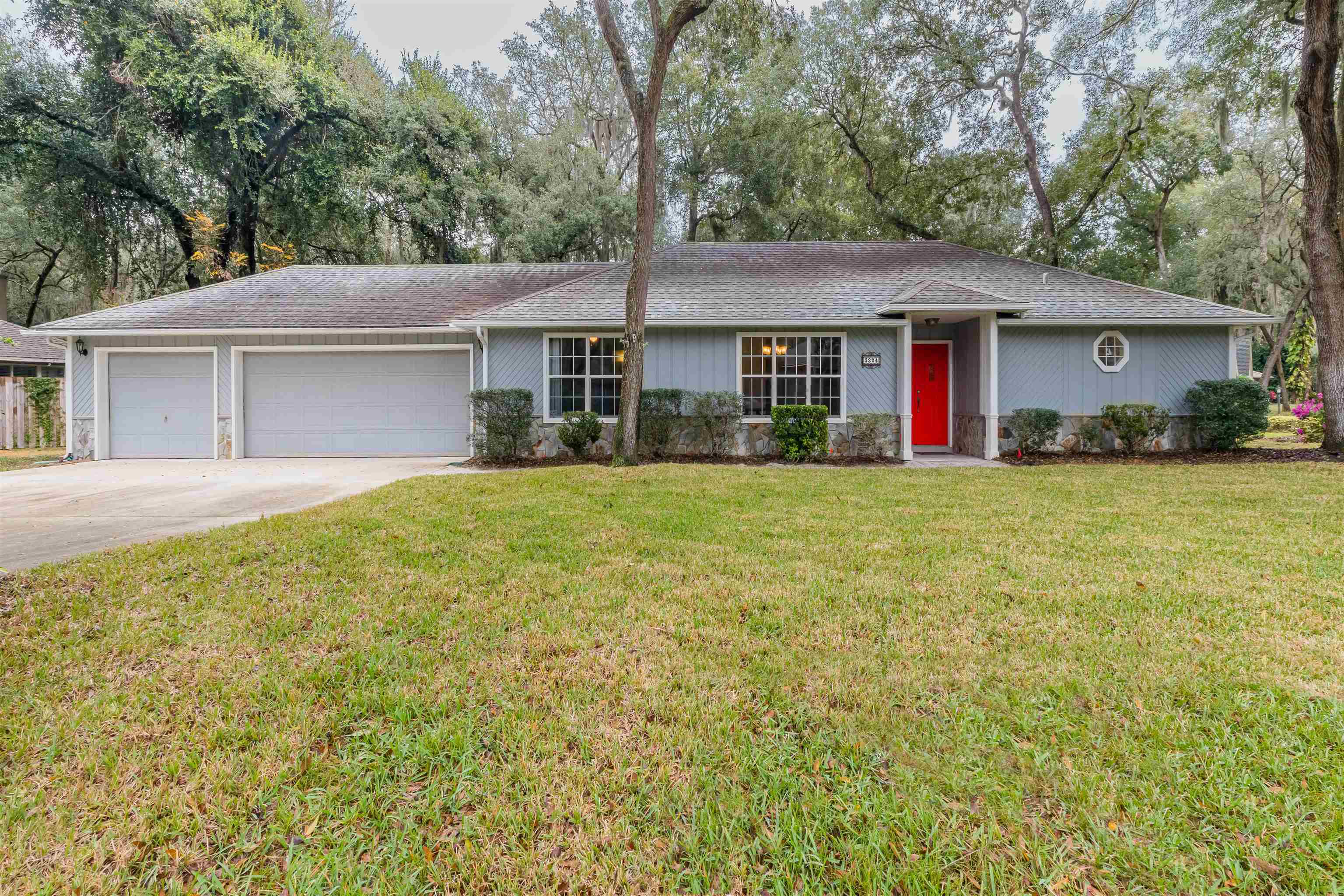 3224 Turtle Creek Road St. Augustine, FL 32086 - Photo 1 of 44 front view of a house with a yard