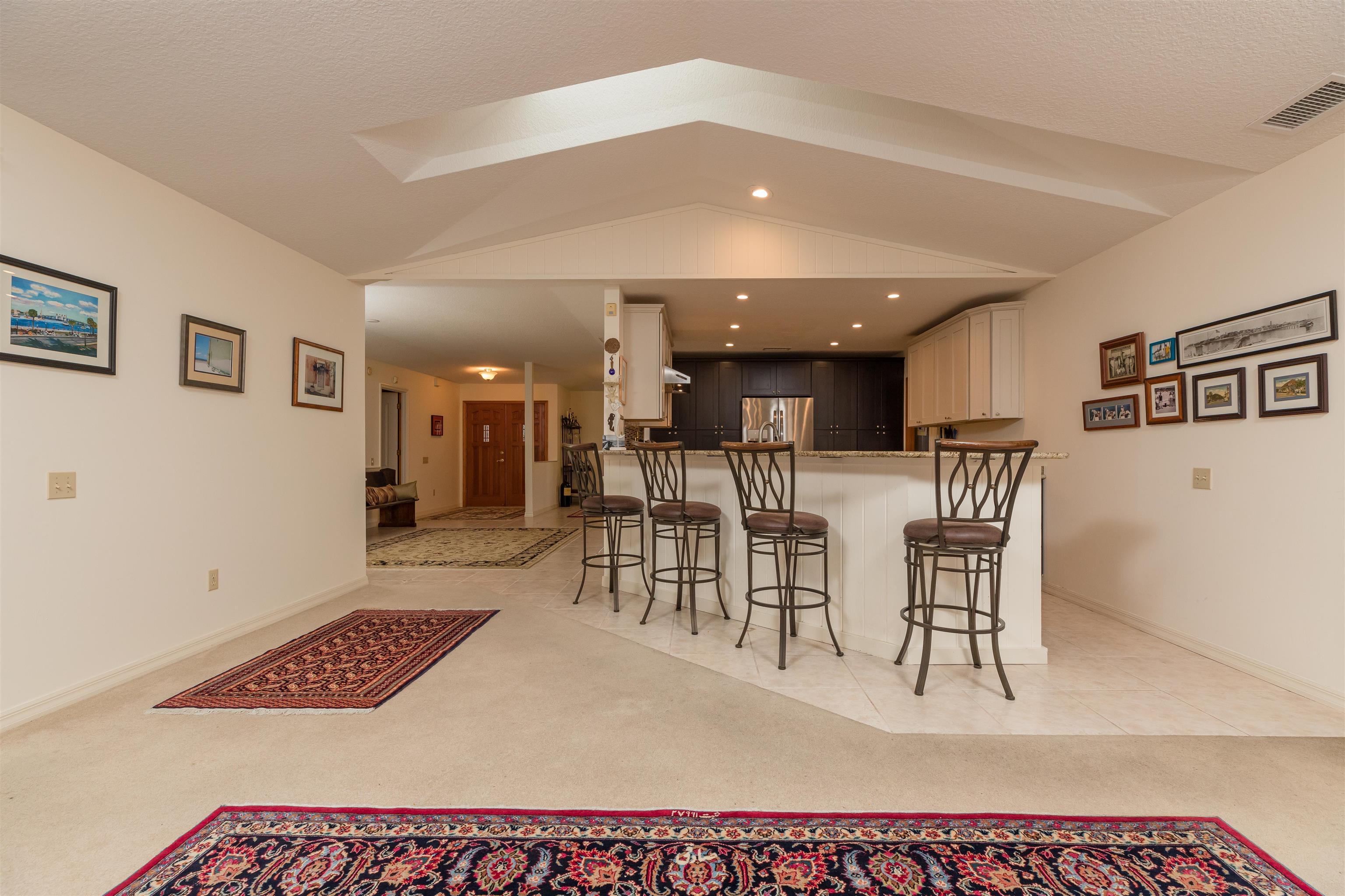 3224 Turtle Creek Road St. Augustine, FL 32086 - Photo 13 of 44 a view of a dining room with furniture