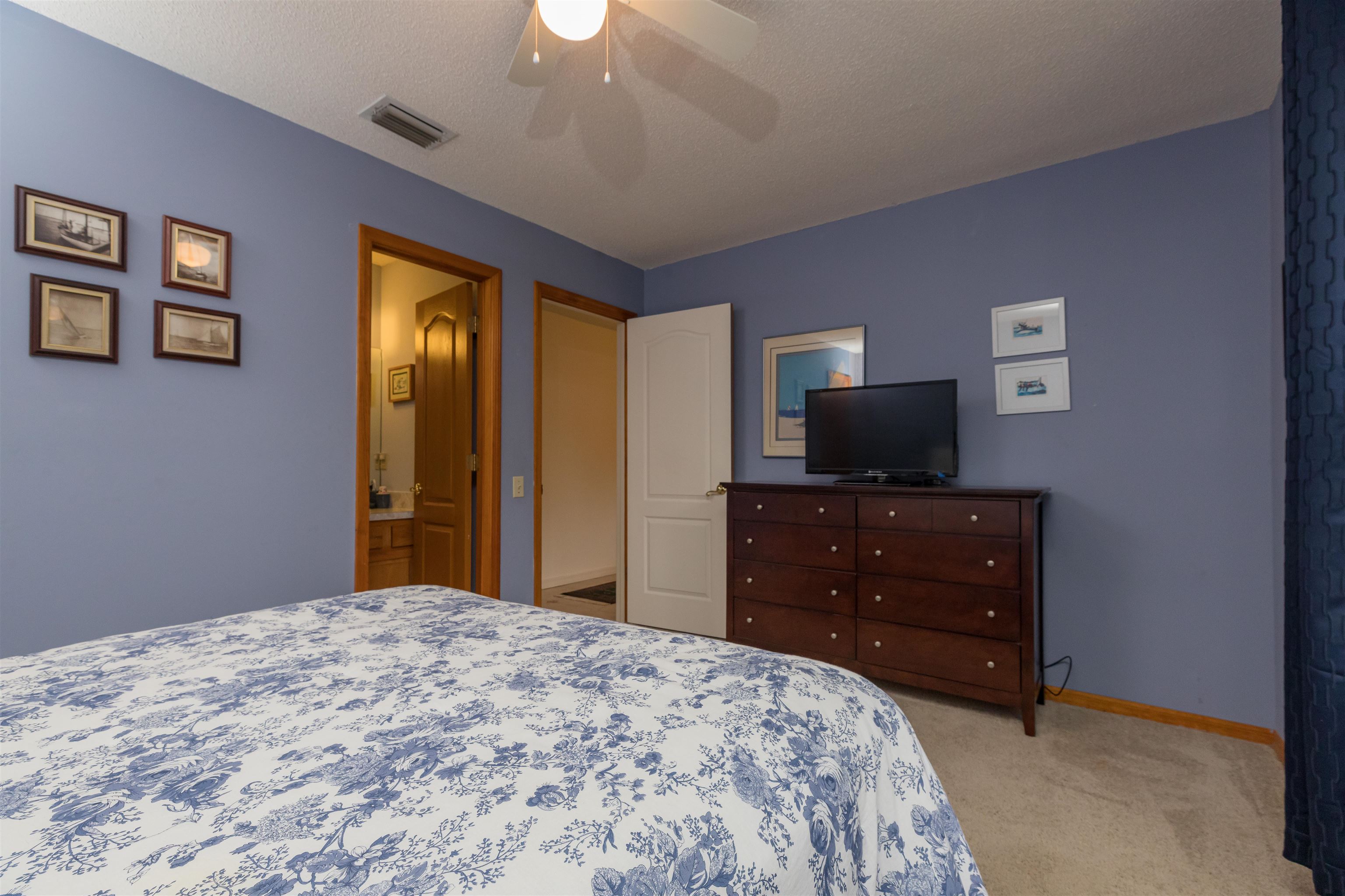 3224 Turtle Creek Road St. Augustine, FL 32086 - Photo 33 of 44 a bedroom with a bed and a television