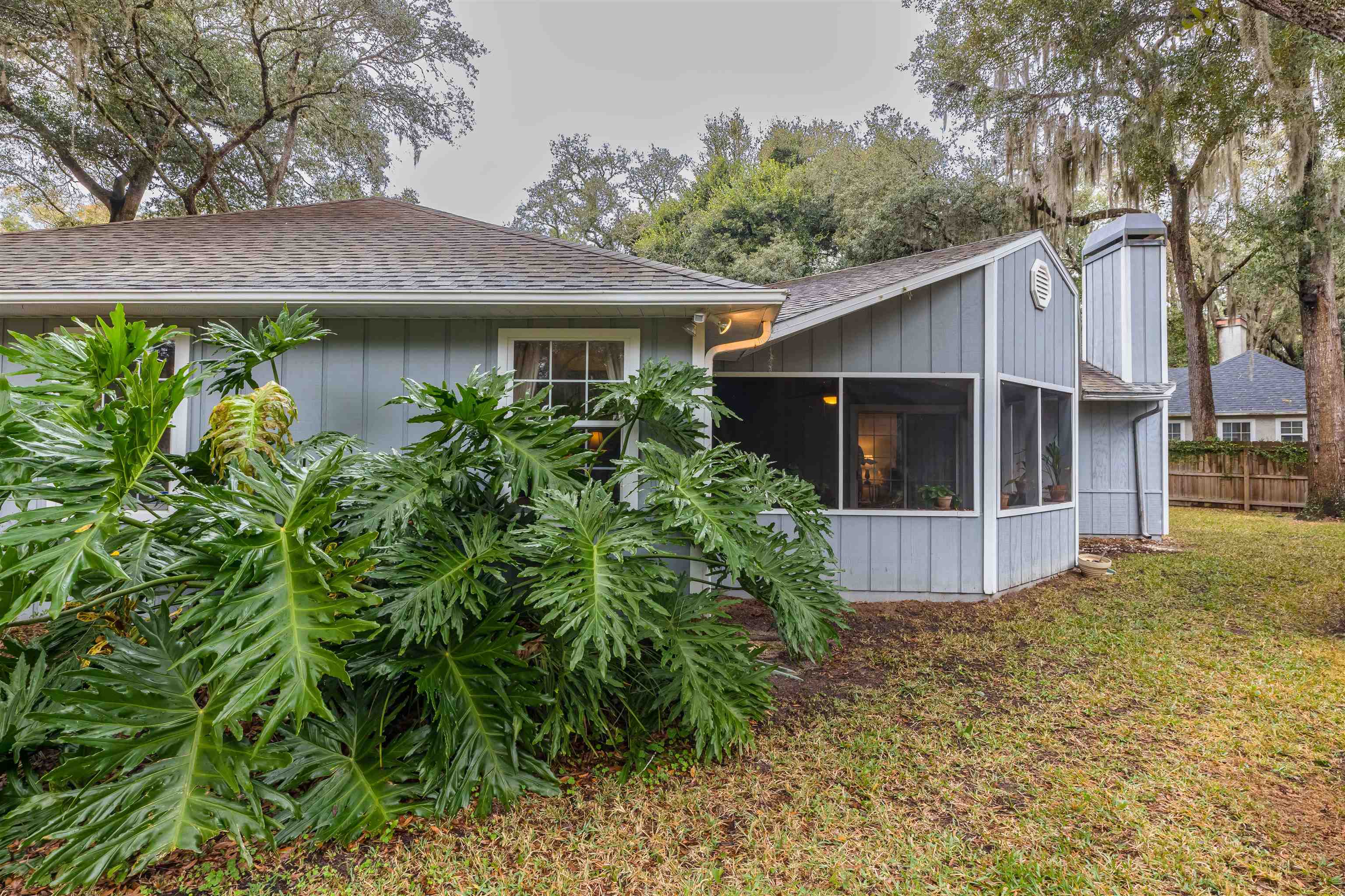 3224 Turtle Creek Road St. Augustine, FL 32086 - Photo 4 of 44 a view of a house with a yard and plants