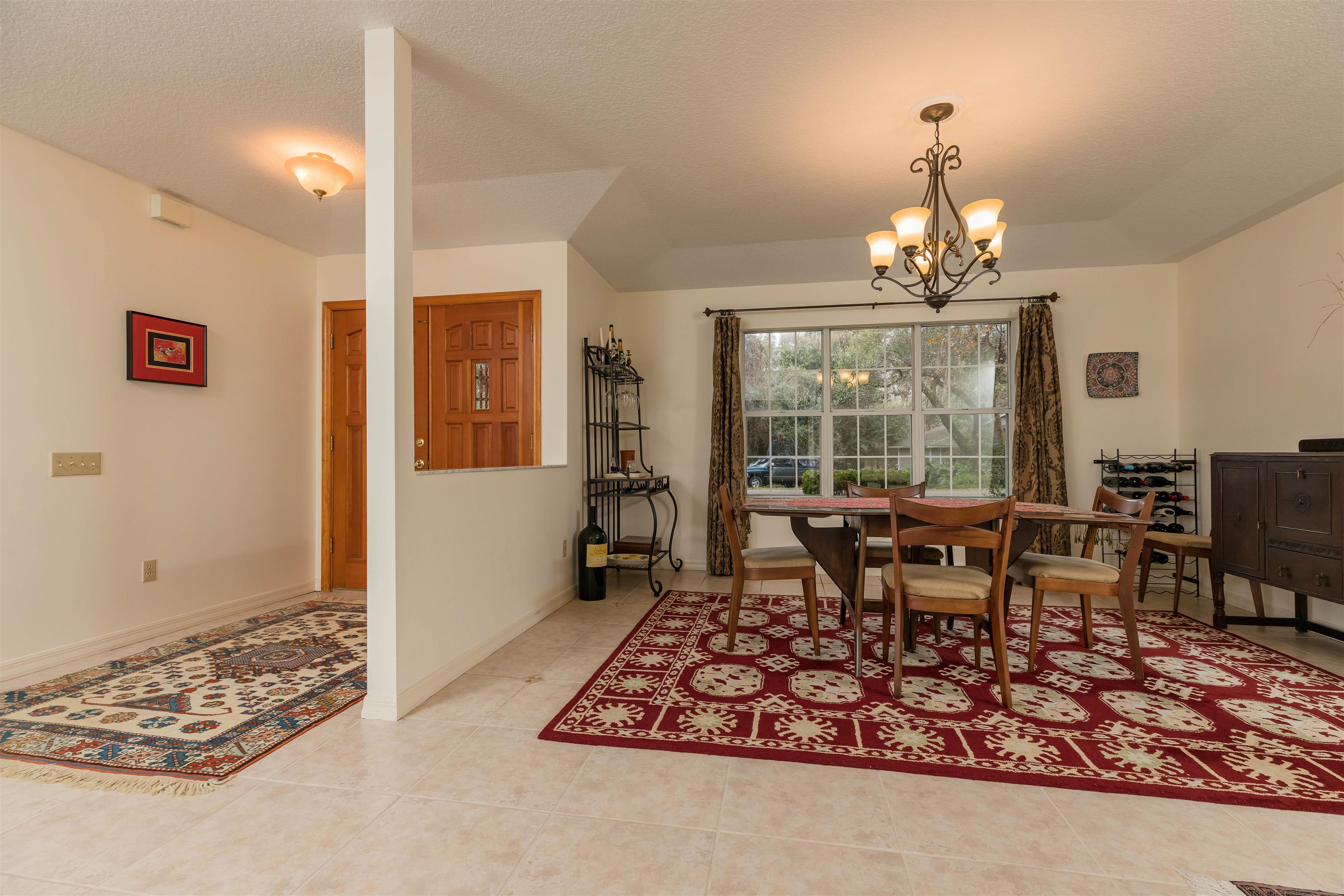 3224 Turtle Creek Road St. Augustine, FL 32086 - Photo 6 of 44 a view of a dining room with furniture